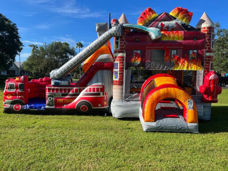 Firehouse Bounce House with double lane slide